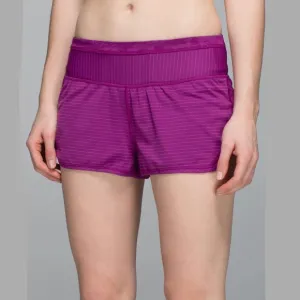 Lululemon Run For Days Short in Regal Plum with a gold zipper