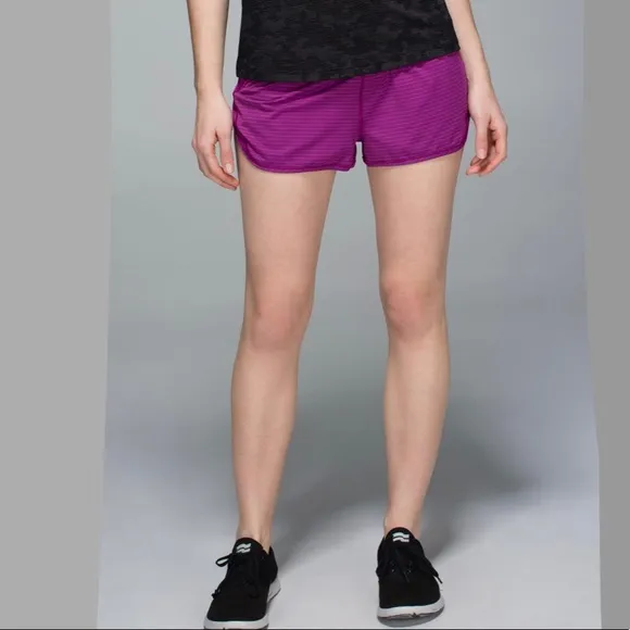 Lululemon Run For Days Short in Regal Plum with a gold zipper