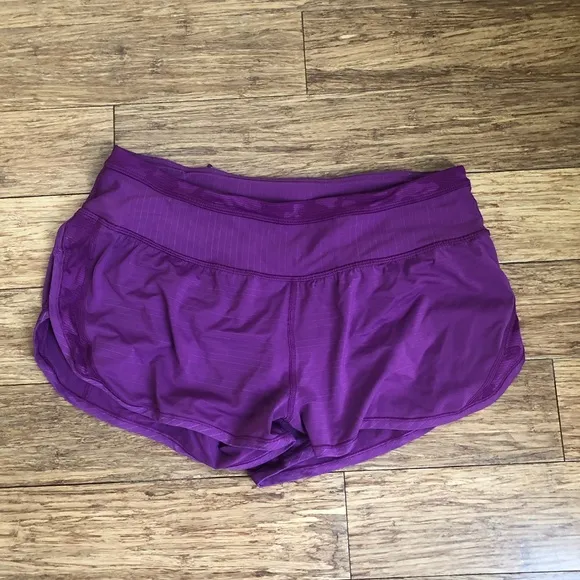 Lululemon Run For Days Short in Regal Plum with a gold zipper