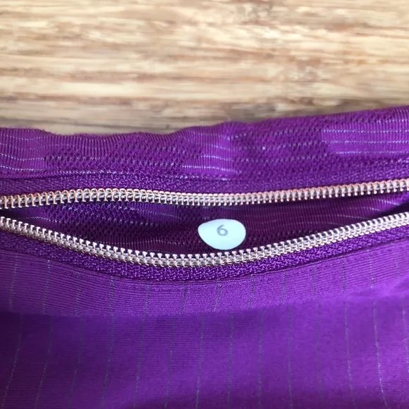 Lululemon Run For Days Short in Regal Plum with a gold zipper