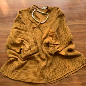 October Top Mustard